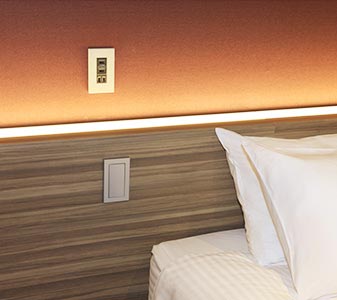 Electrical outlets and USB ports by every bedside