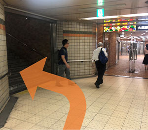 Turn left before Osaka Station 3 Building and take the stairs.
